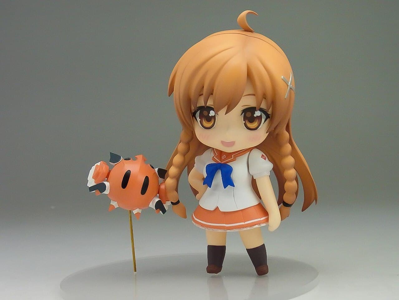 A Nendoroid figure of Mirai Suenaga, showing the line's chibi proportions and swappable parts